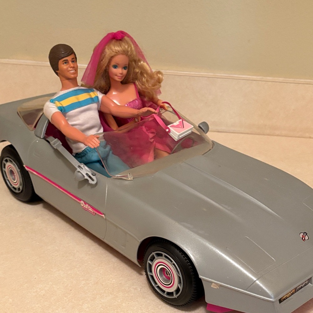 1980’s Barbie & Ken  in their silver Corvette Convertible  Car.